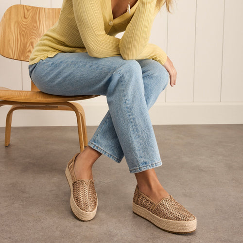 On model image of the of the bronze geo woven Valencia platform espadrille