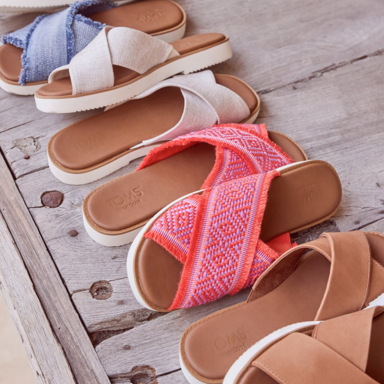 Laydown image of the flame global woven Mae Sandals
