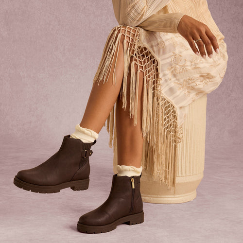 On model image of the Astrid brown boot